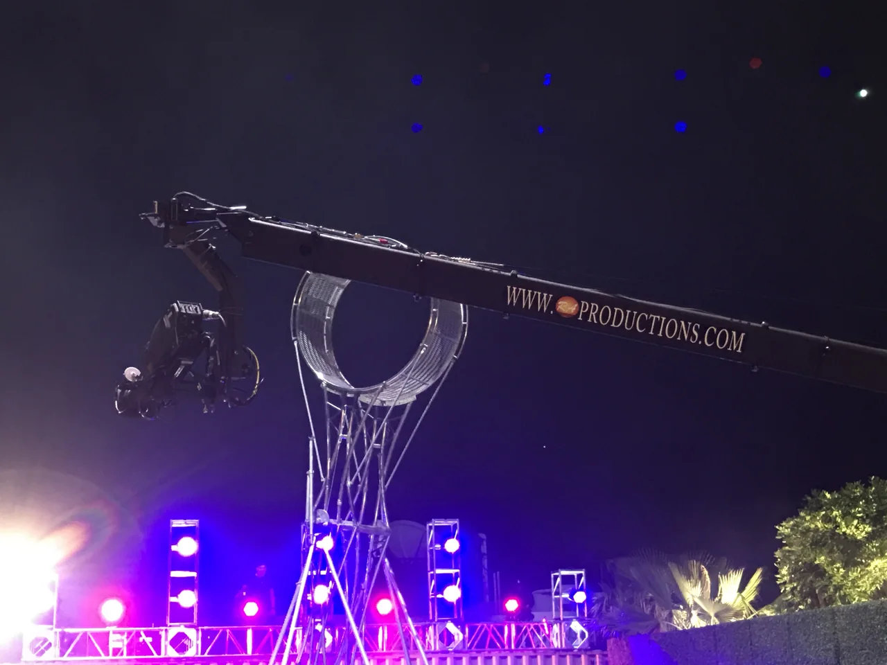 RA Productions camera crane extended over a nighttime stage